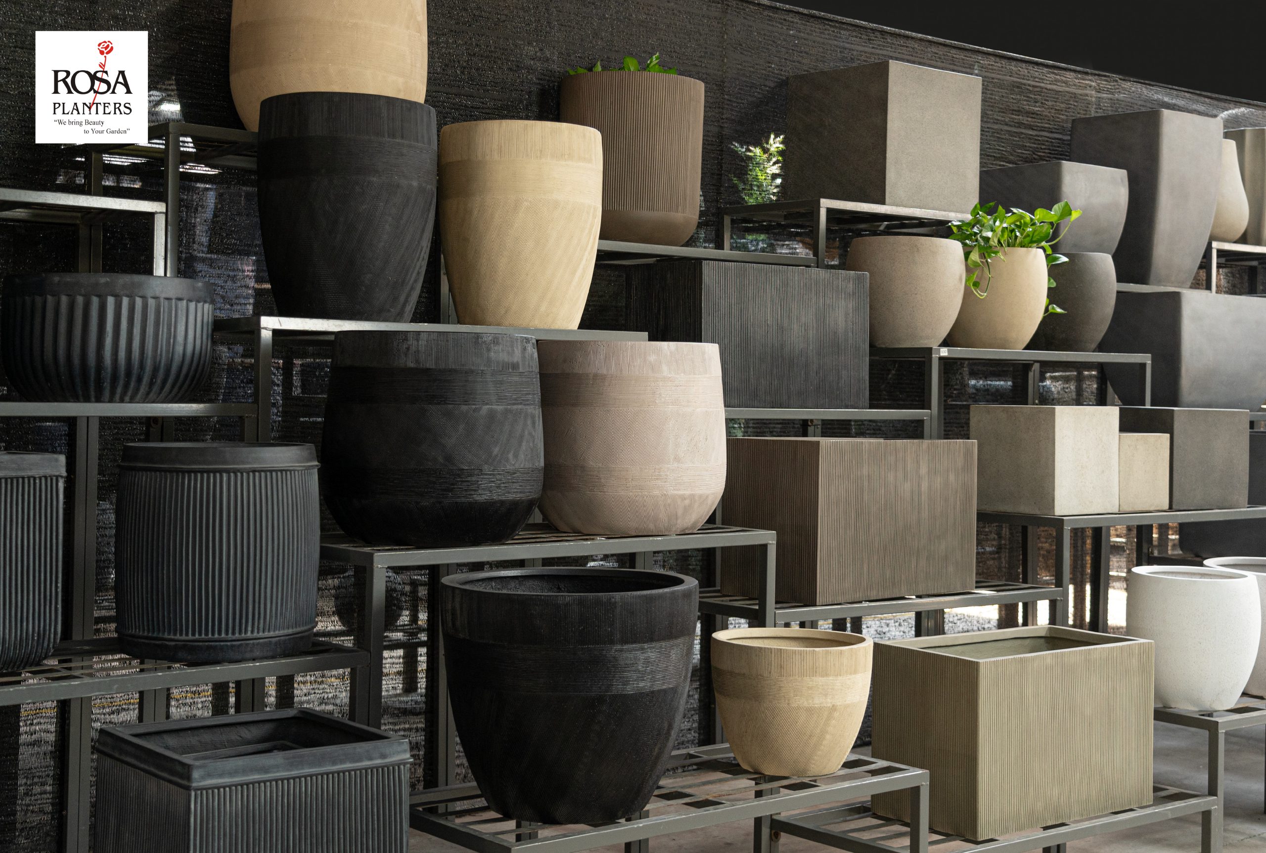 Warehouse photo of nested polystone pots on the racks